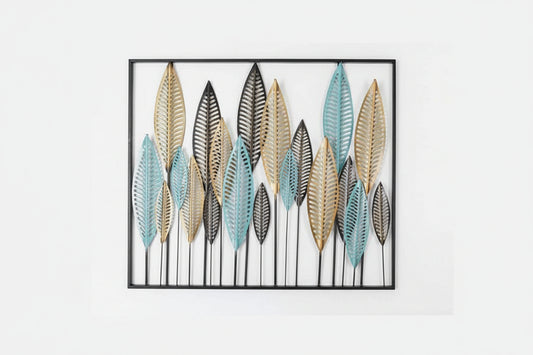 Decorative wall art with leaf patterns in a gold frame on a white background