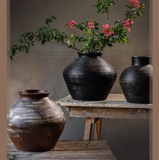 Dark gray wabi-sabi ceramic planter with organic textures