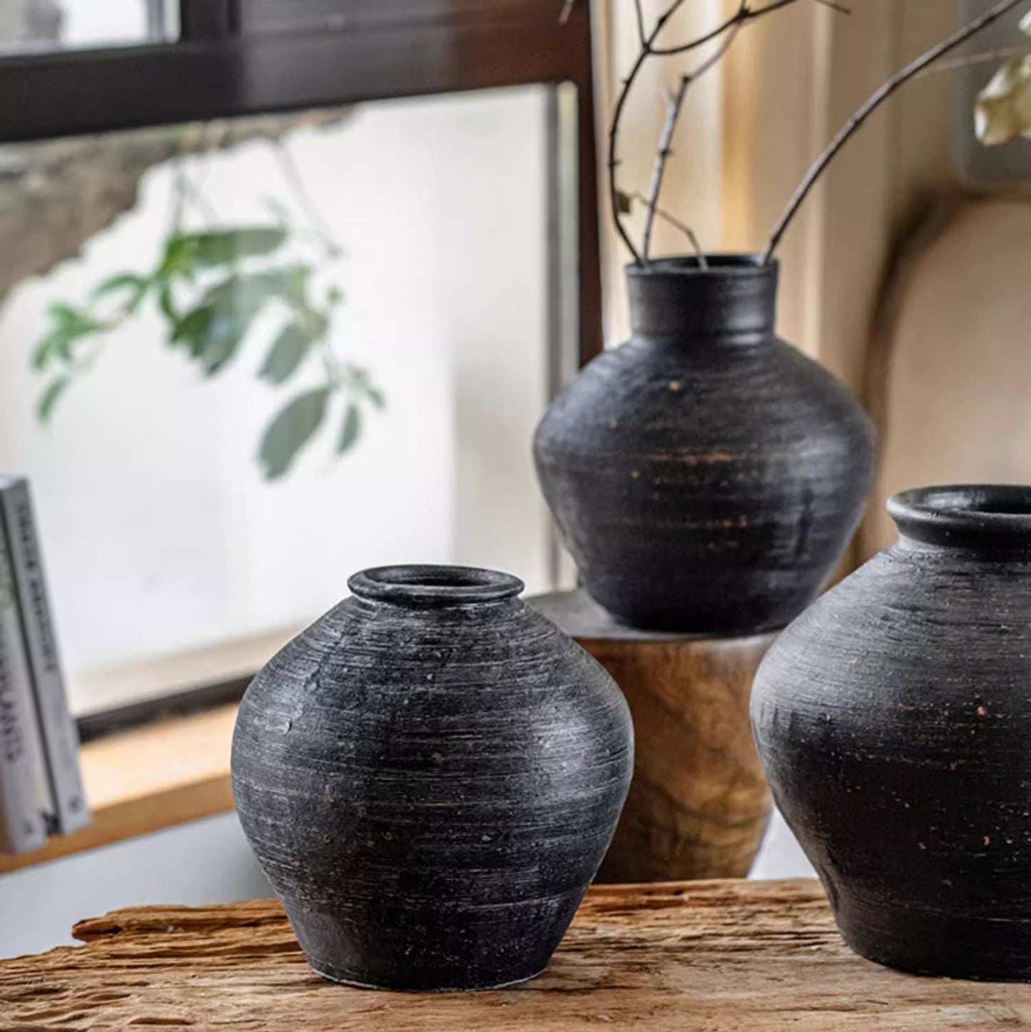 Dark gray wabi-sabi ceramic planter with organic textures