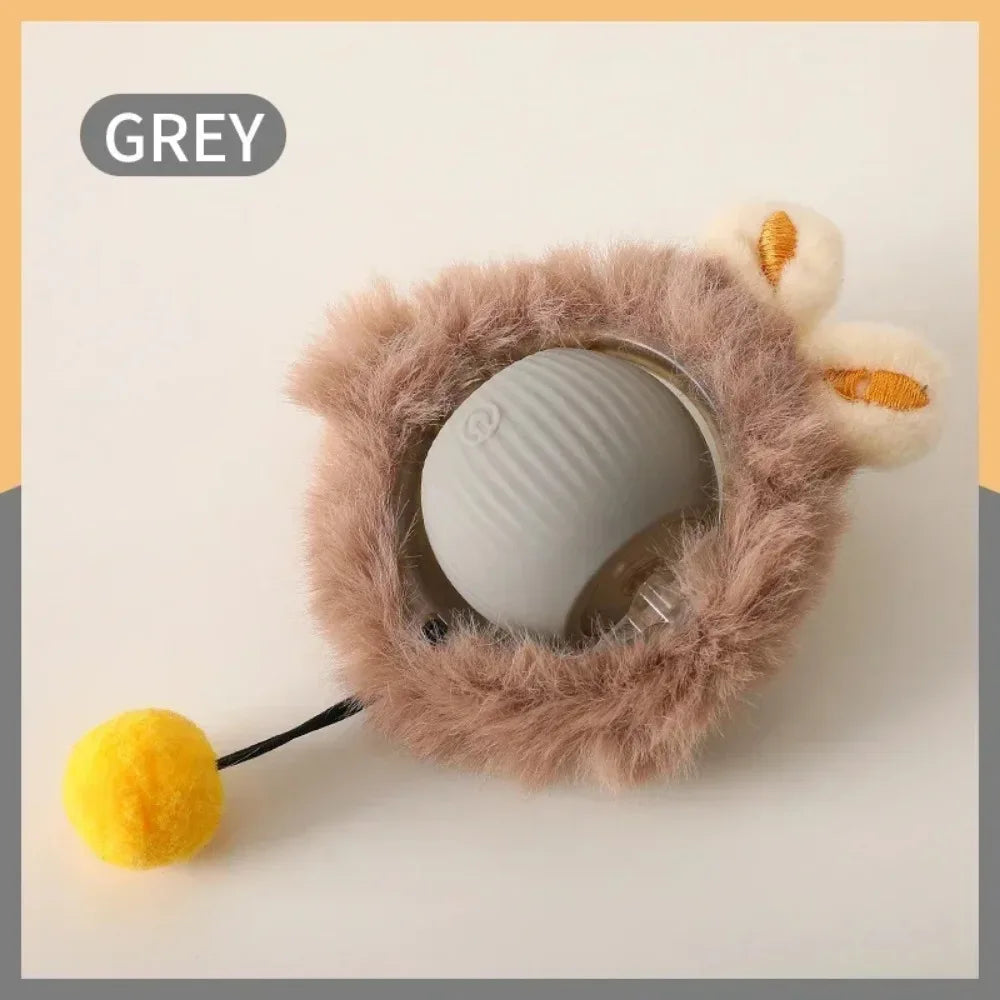 Fluffy gray cat toy with a yellow ball on a light background cat toy