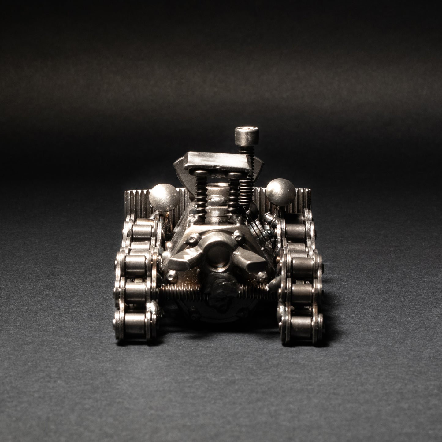 Upcycled steel bulldozer statue with rustic industrial charm