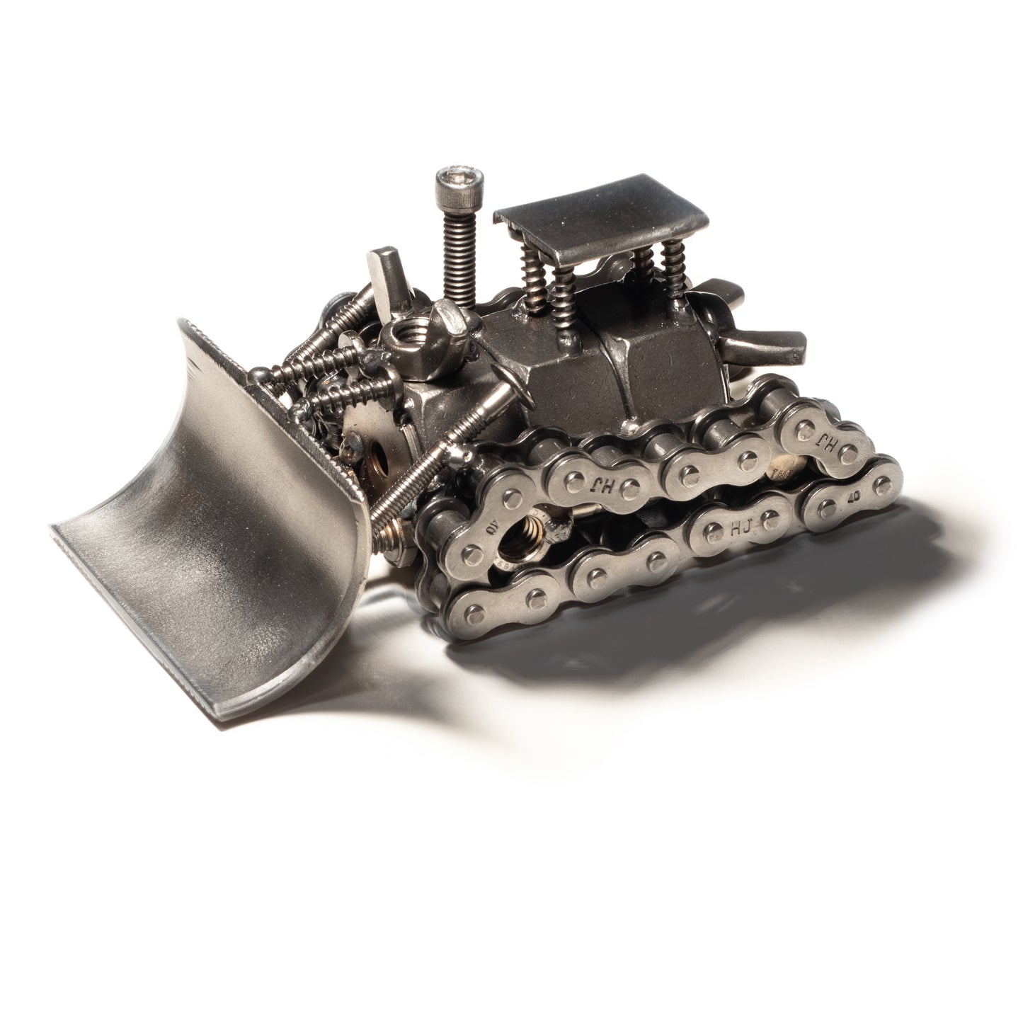 Upcycled steel bulldozer statue with rustic industrial charm