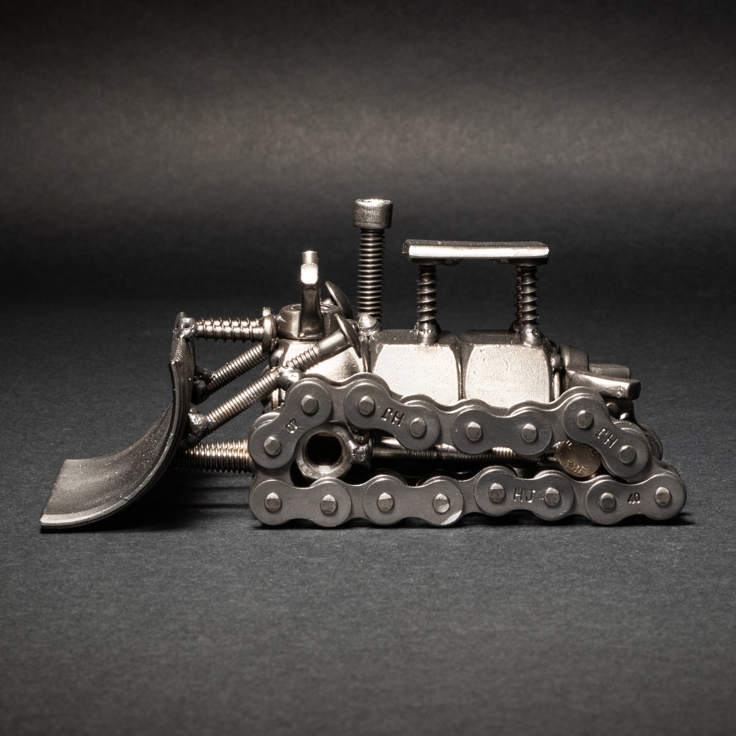 Welded nuts and bolts dozer sculpture for construction lovers