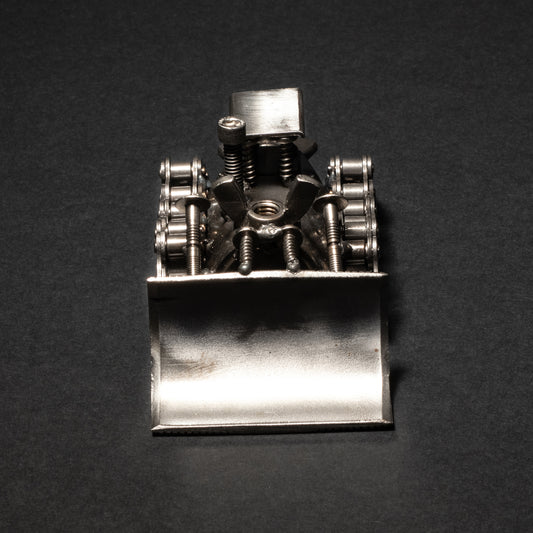 Handmade scrap metal bulldozer figurine made from recycled steel