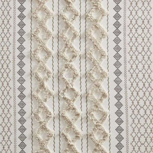 Close-up of the textured geometric pattern and tufted chenille stripe on the ivory Imani cotton curtain panel.