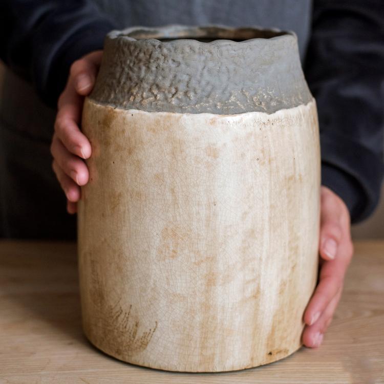 Rustic farmhouse flower vase with coarse pottery texture