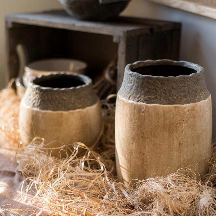 Handmade khaki coarse pottery jar with earthy tones
