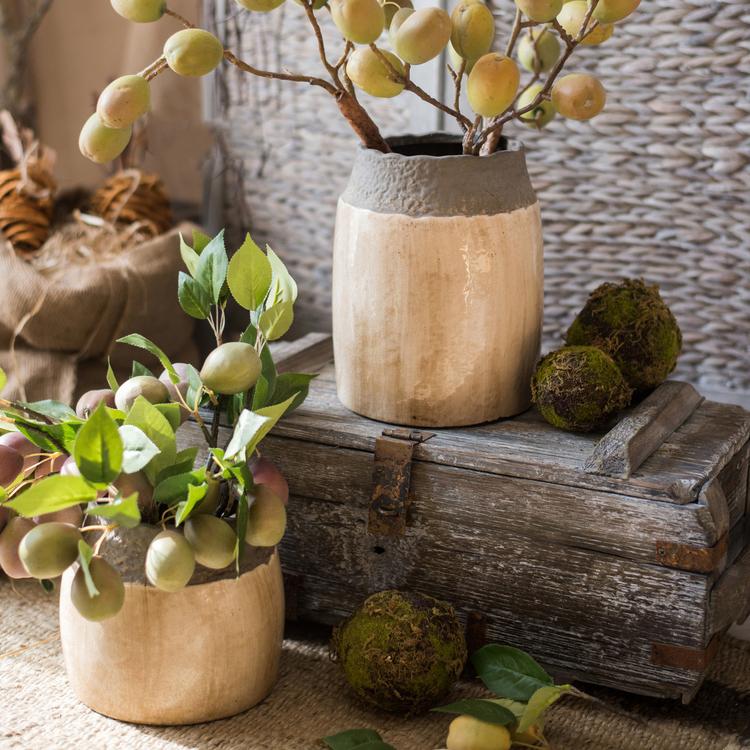 Minimalist Japandi-style pottery jar in brown and khaki hues