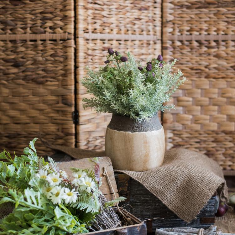 Earthy tone pottery jar perfect for boho and minimalist interiors