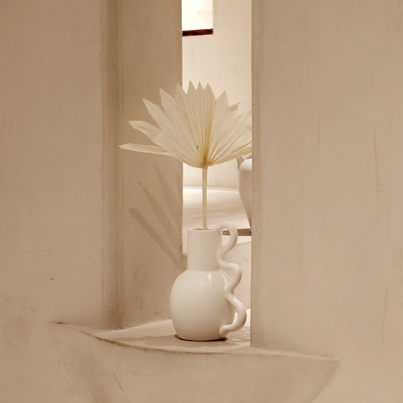 Minimalist ceramic vase in neutral tones for modern home décor