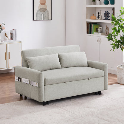 Light gray sofa bed in a living room setting with decor elements.