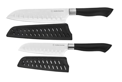 Set of three knives with black handles on a white background