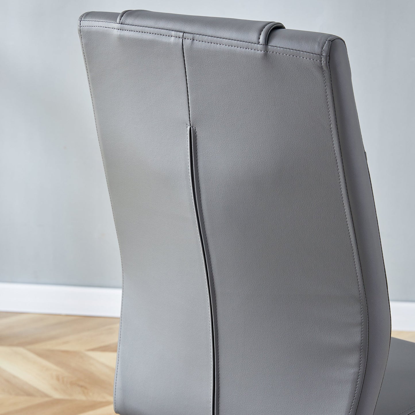 Contemporary Padded Grey Dining Chair with Plated Legs