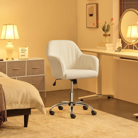 White office chair in a bedroom setting with a dresser and mirror.