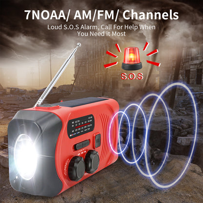 Red and gray emergency radio with flashlight on a rocky background