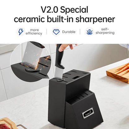 Black ceramic built-in knife sharpener block shown on a kitchen countertop with a hand inserting a knife handle into the sharpening slot. The image includes marketing text at the top and a circular inset showing sparks from the sharpening process.