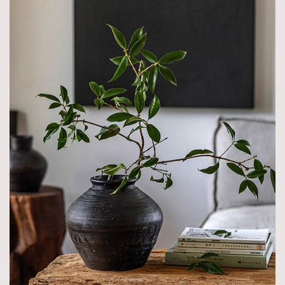 Dark gray wabi-sabi ceramic planter with organic textures