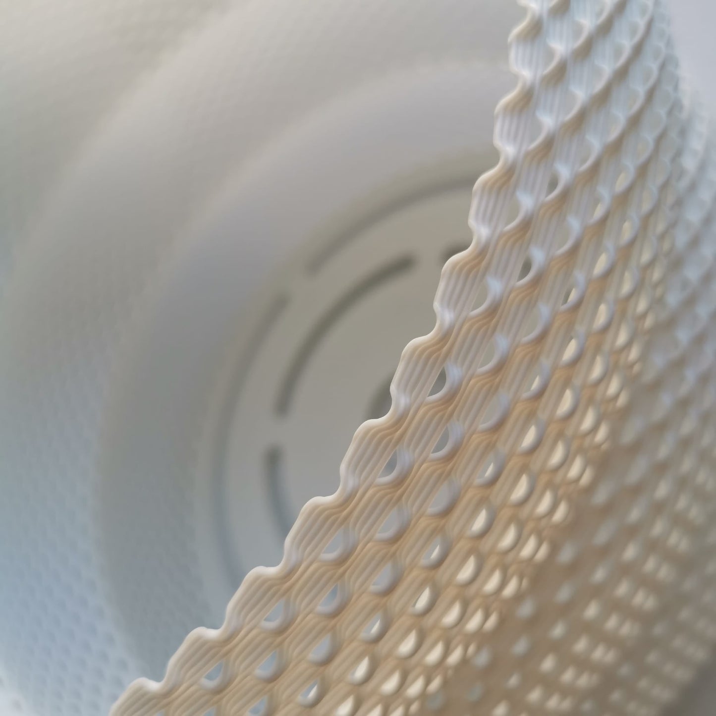 Close-up of a textured white object with a detailed pattern