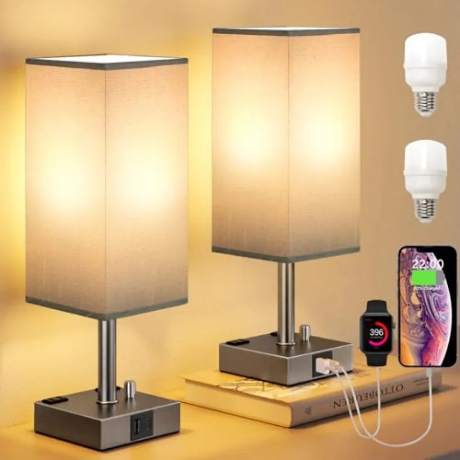 Two table lamps with a smartphone, smartwatch, and light bulbs on a yellow background