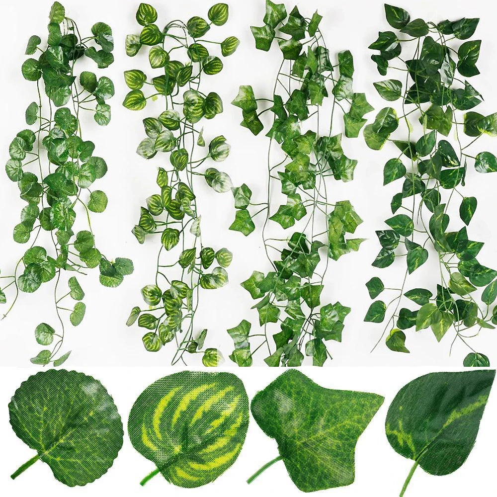 Collection of artificial green vines and leaves on a white background