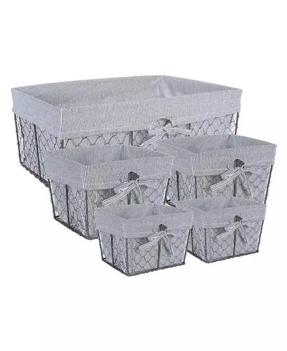 Set of five vintage-inspired wire storage baskets with gray ticking-stripe fabric liners and decorative bows.