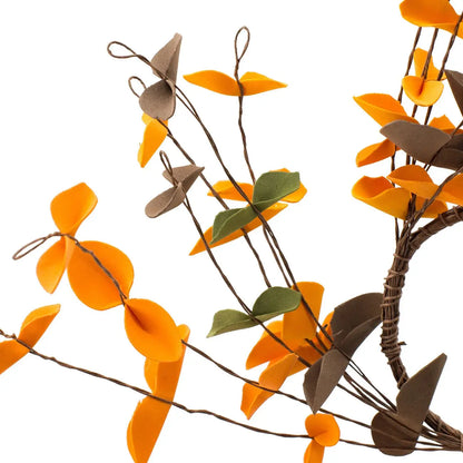 Decorative branch with orange and brown leaves on a white background