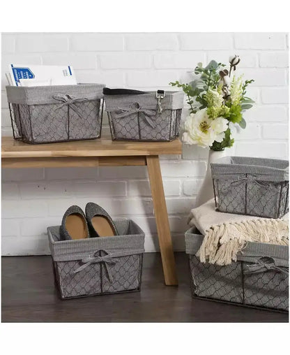 Vintage-style lined wire baskets used for shoes, blankets, mail, and decorative home storage.