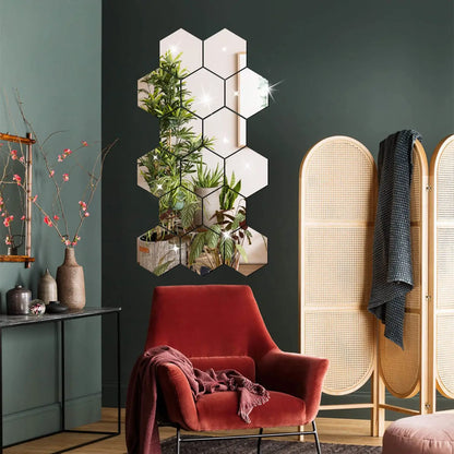 Modern interior with hexagonal mirror, red chair, and rattan screen against a dark wall.