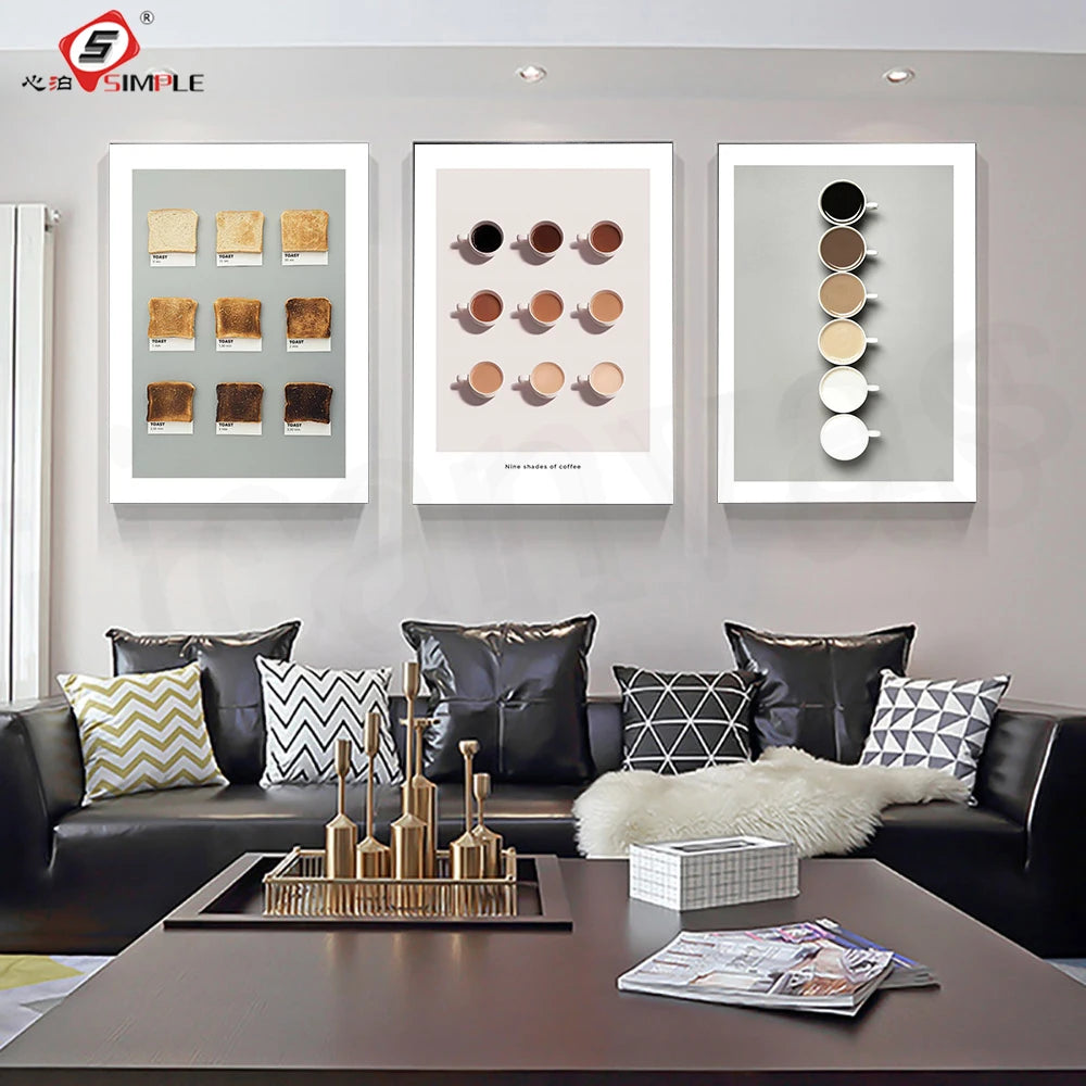 Modern living room with a gray sofa, decorative pillows, and wall art.