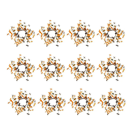 A repeating pattern of nine circular floral wreaths arranged in a 3x3 grid on a plain white background. Each wreath features orange and yellow flowers with dark green leaves and black stems.