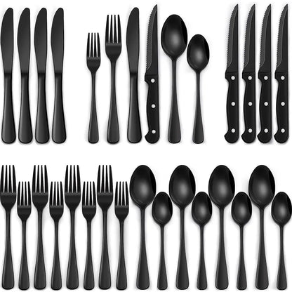 Set of black cutlery including knives, forks, and spoons on a white background