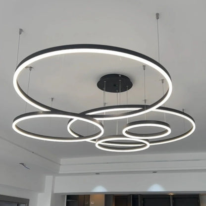 Modern chandelier with circular design on a ceiling