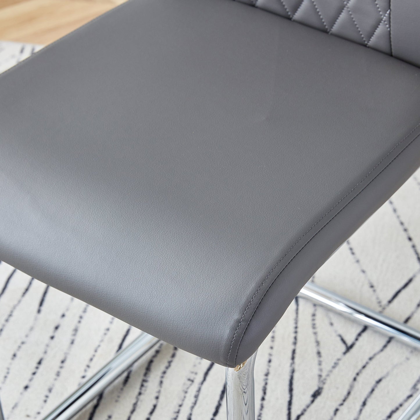 Contemporary Padded Grey Dining Chair with Plated Legs