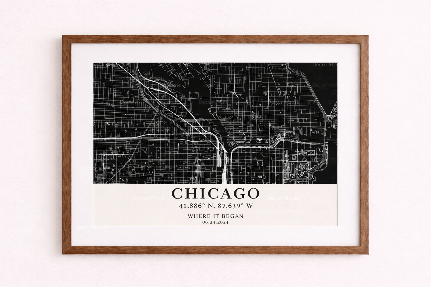 Framed black and white map of Chicago on a white wall