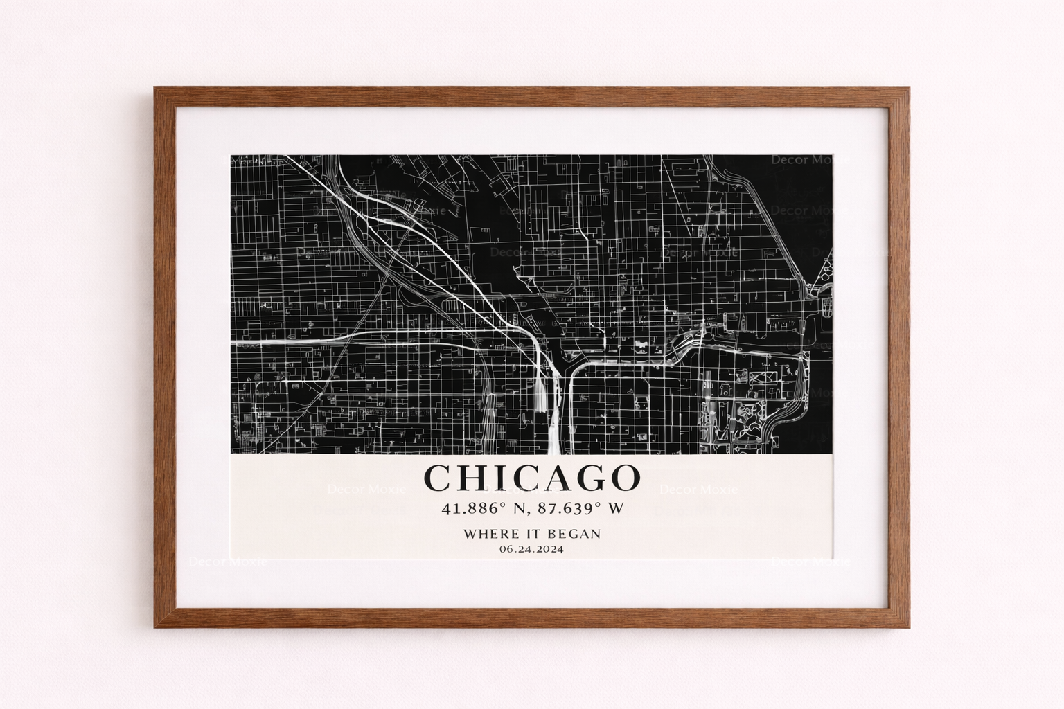 Framed black and white map of Chicago on a white wall