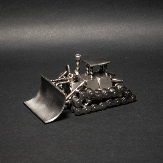 Handmade scrap metal bulldozer figurine made from recycled steel