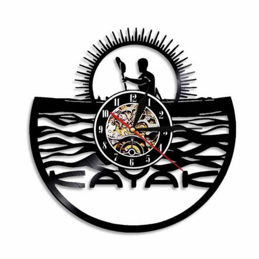 Wall clock with kayaker design and 'KAYAK' text.