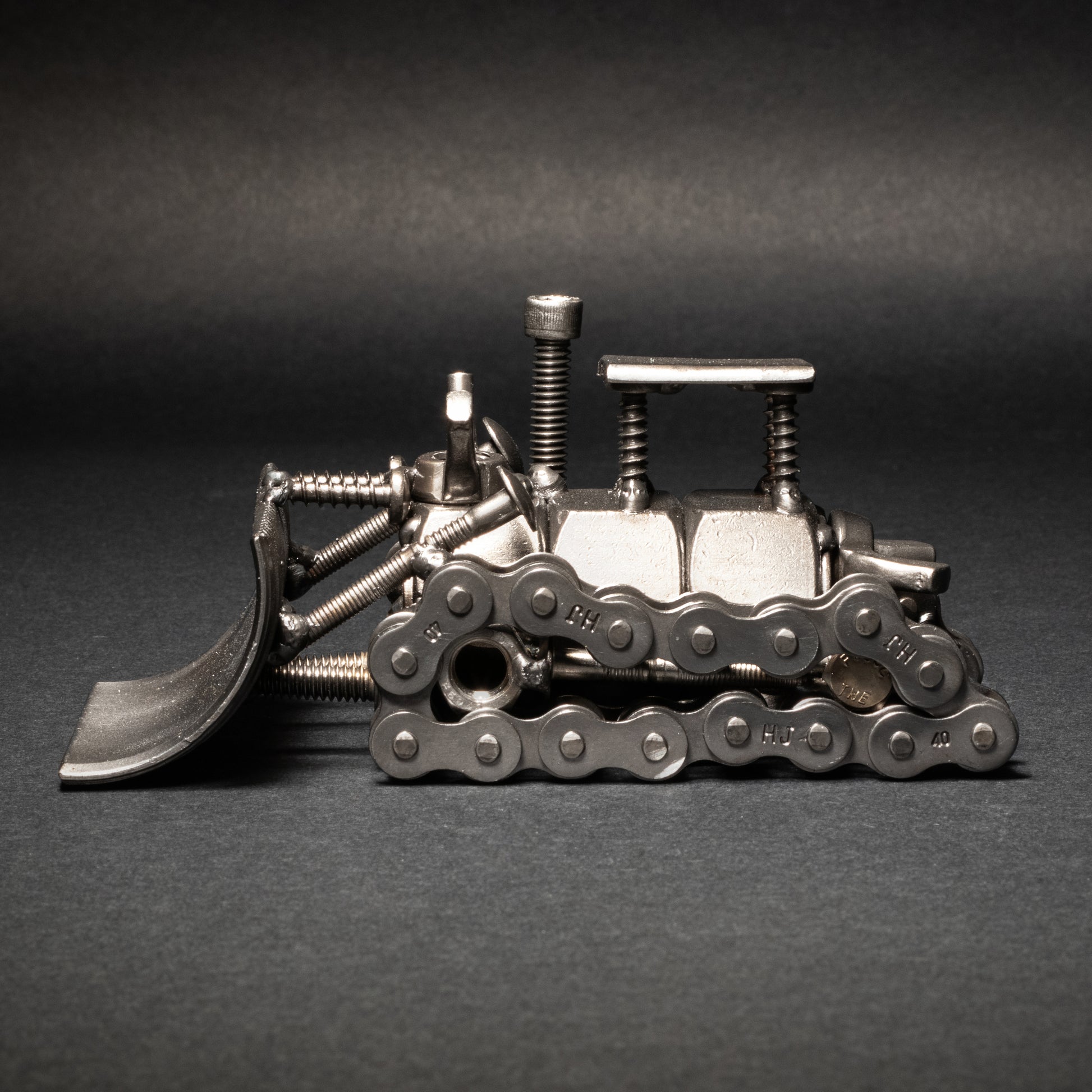 Welded nuts and bolts dozer sculpture for construction lovers