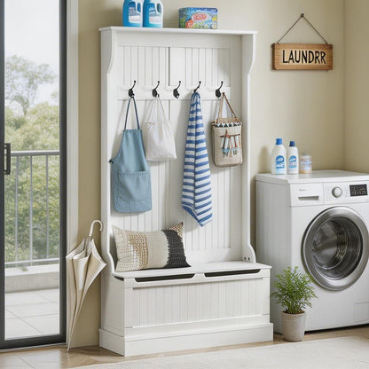 White laundry room with storage bench, hooks, and washing machine.