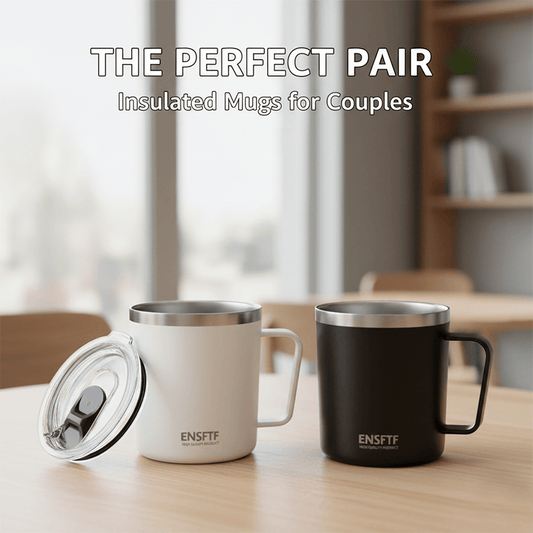 Two insulated mugs, one white and one black, on a table with 'ENSFT' branding.