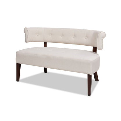 Beige upholstered bench with wooden legs on a white background