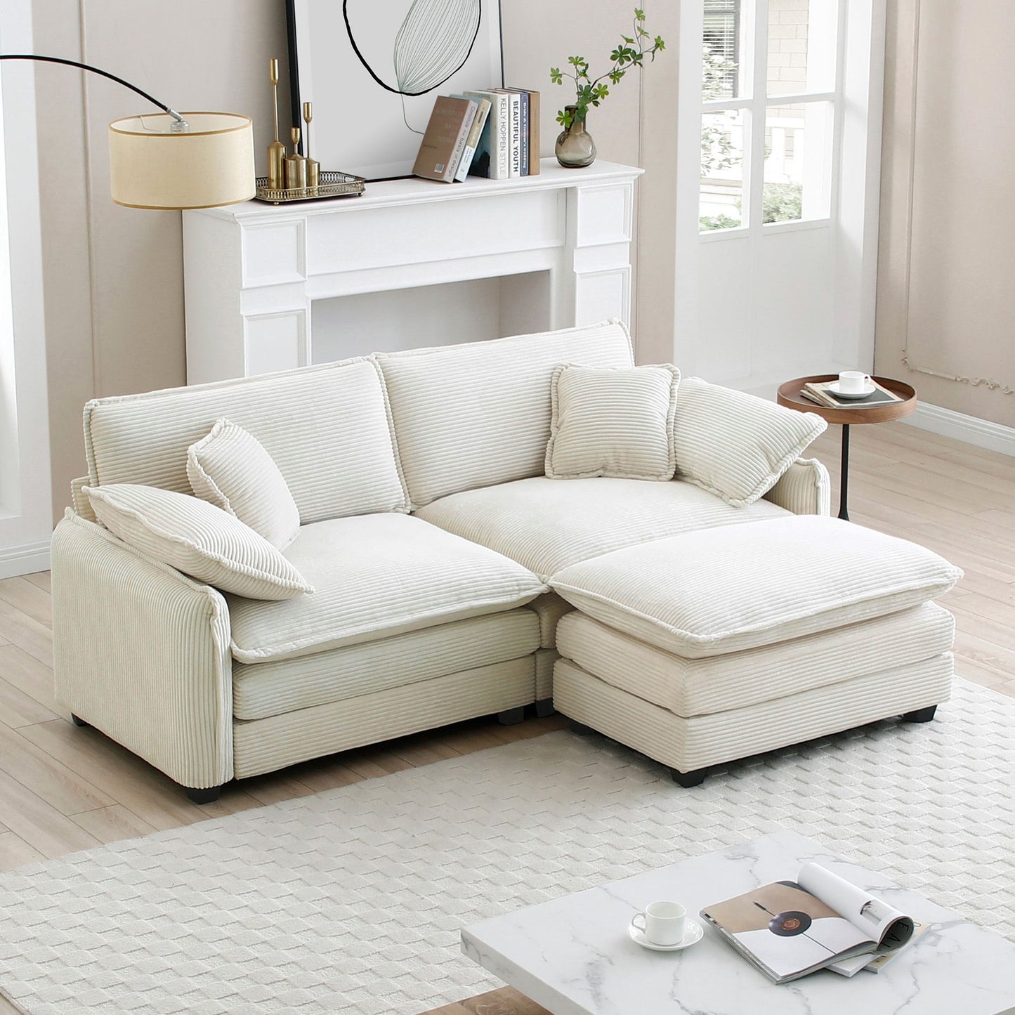Beige sectional sofa in a living room with a coffee table and decor items.