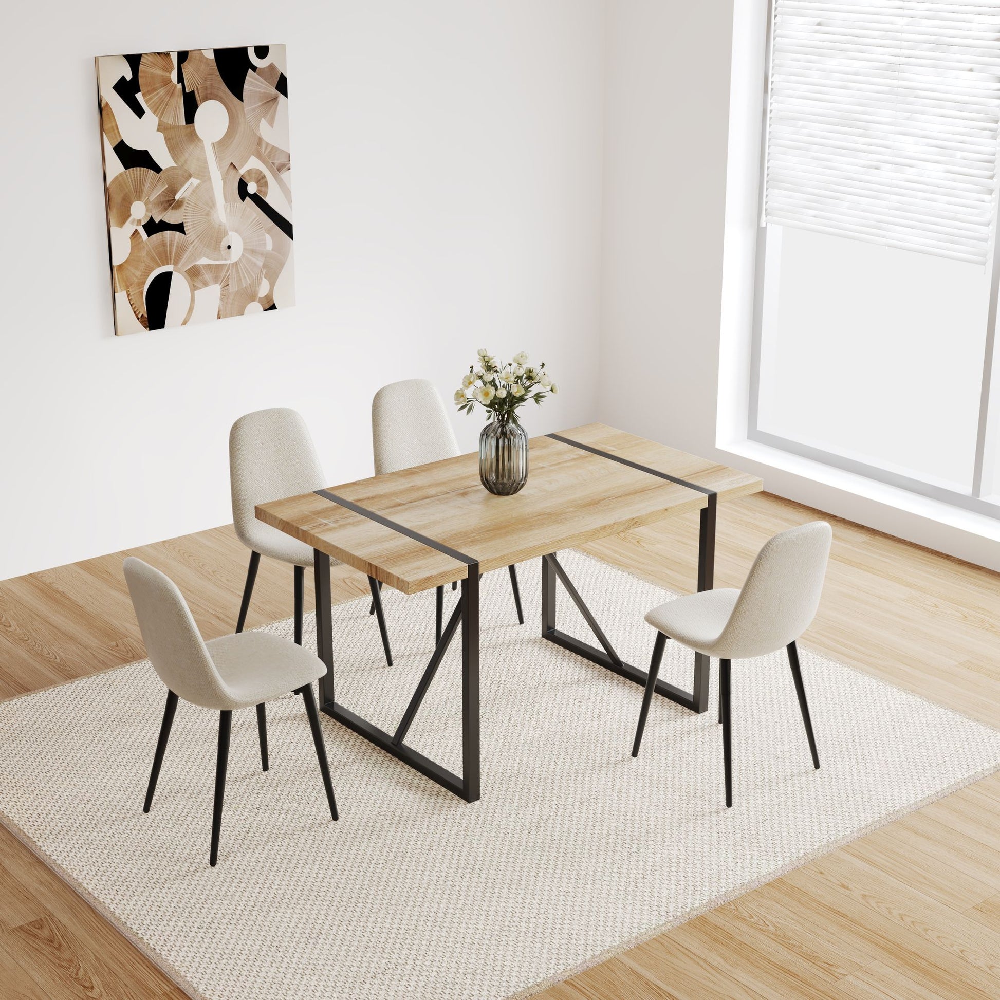 Dining room with a wooden table and chairs on a white rug.