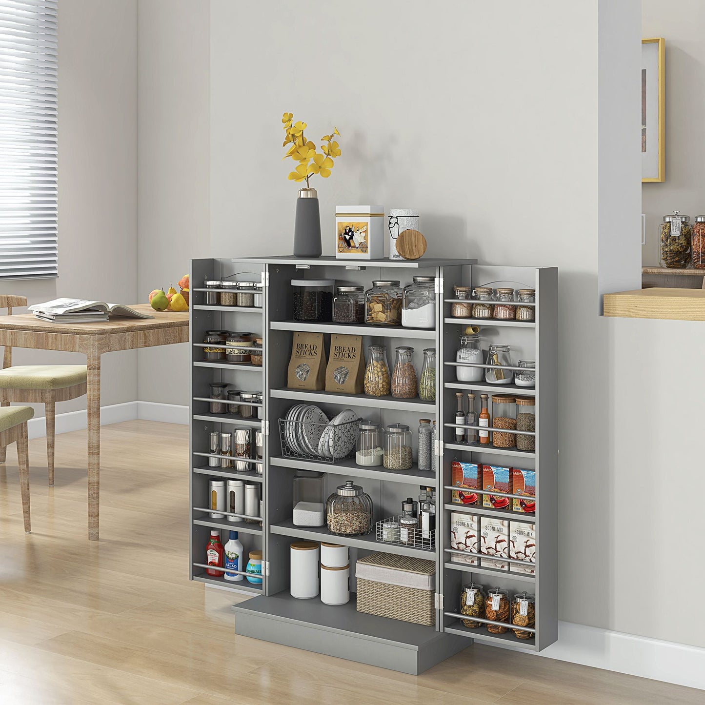 Gray storage cabinet with open doors displaying various items in a kitchen setting.