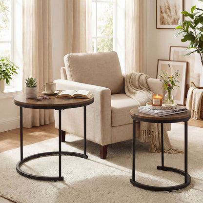 Living room with beige armchair, side tables, and decorative items.