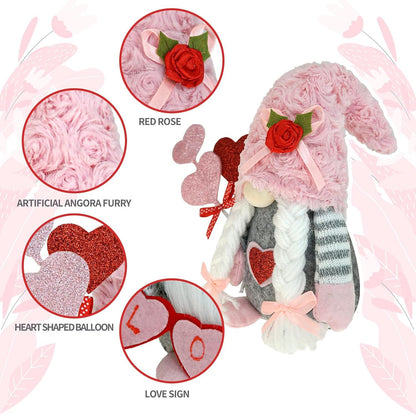 Plush toy with red rose, heart-shaped balloon, and love sign on a pink floral background