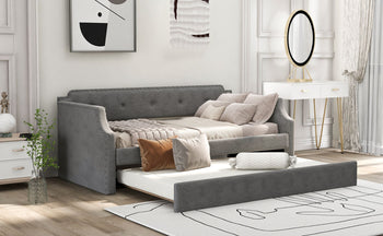 Gray sofa bed in a room with decor elements