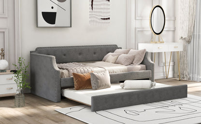 Gray sofa bed in a room with decor elements