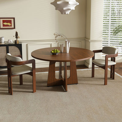Dining room with a wooden round table and chairs.
