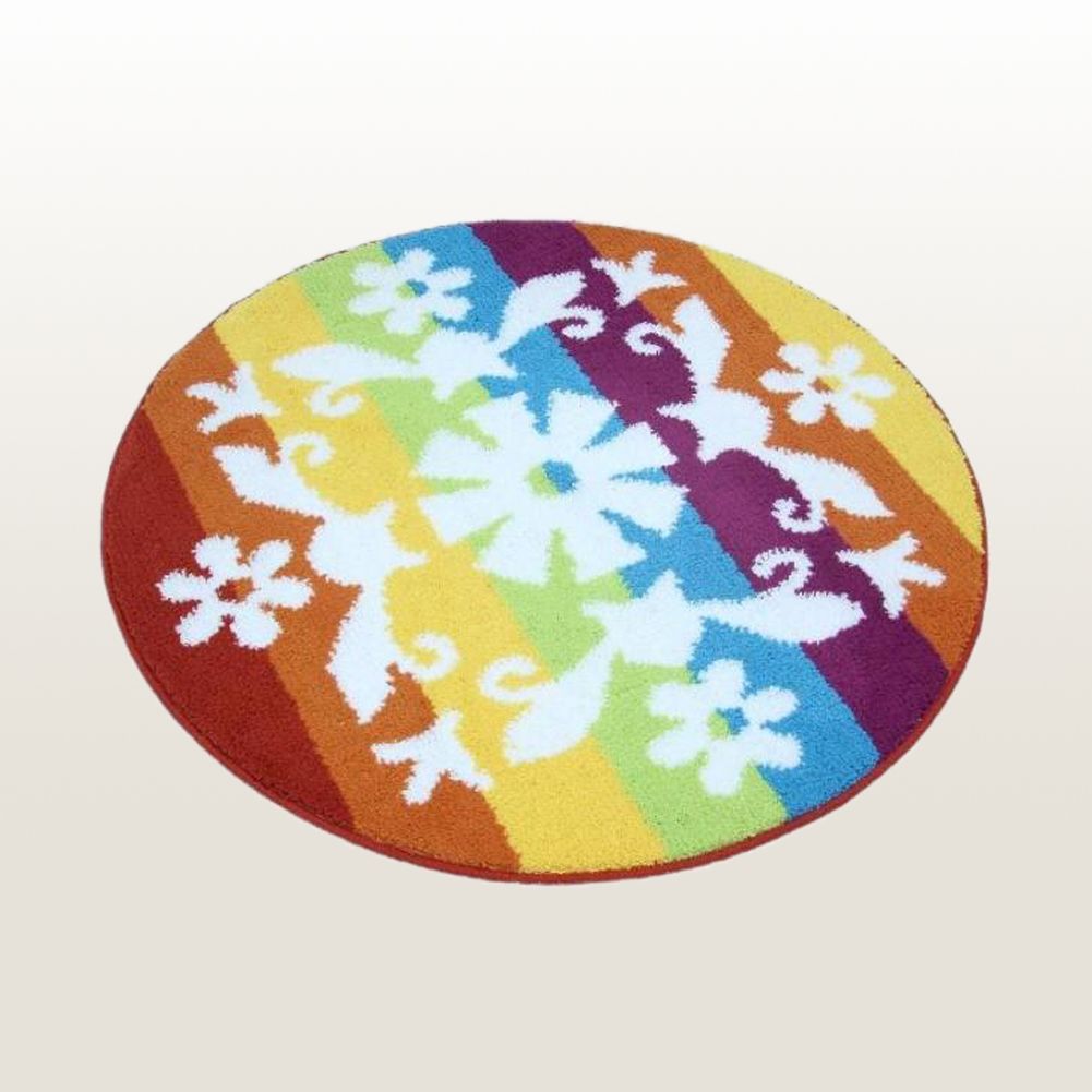 Round colorful rug with floral patterns on a beige background